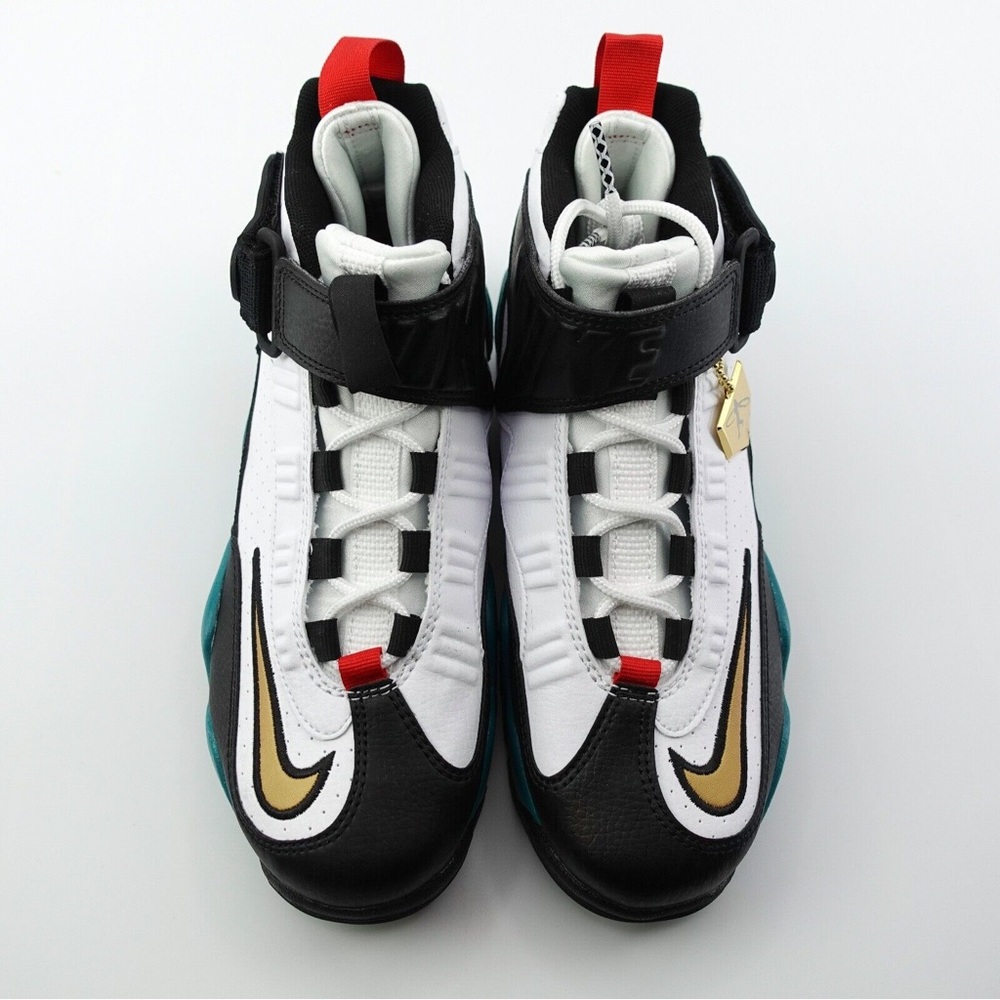 Nike Black and White Sneakers with Gold Accent